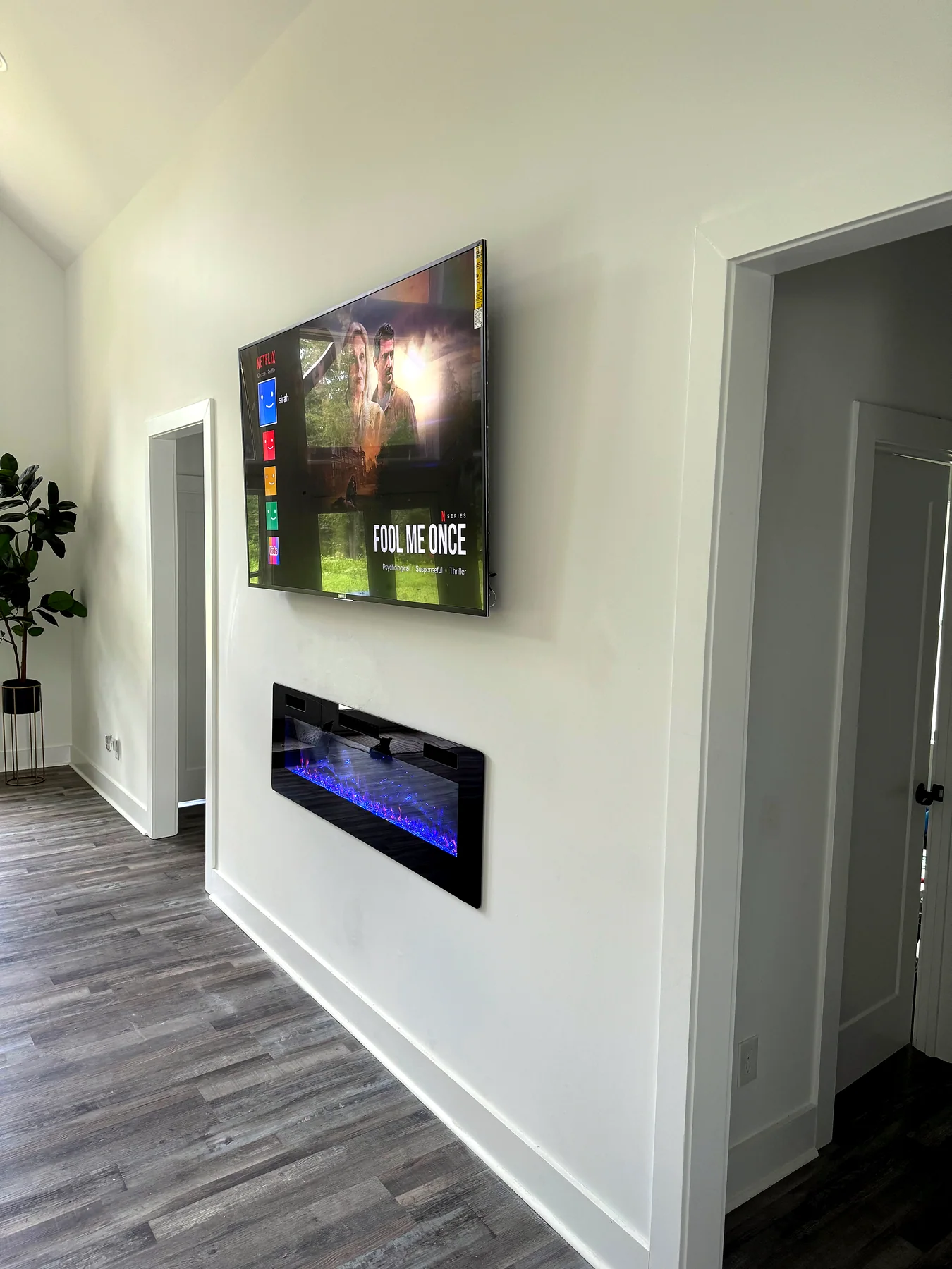 Recessed fireplace inside custom media wall