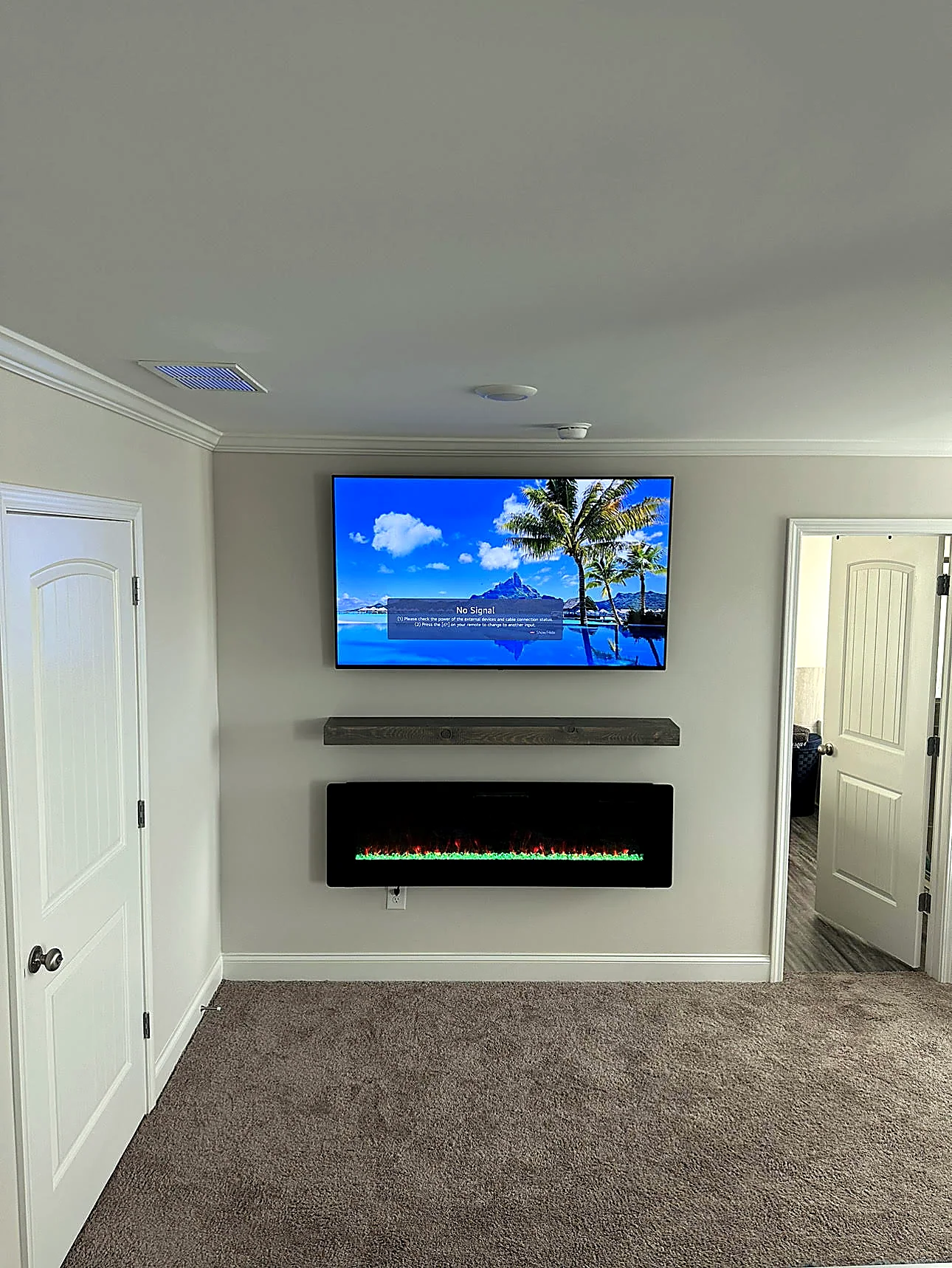 electric fireplace on drywall